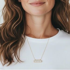 Elegant Gold Necklace with Engraved Pendant